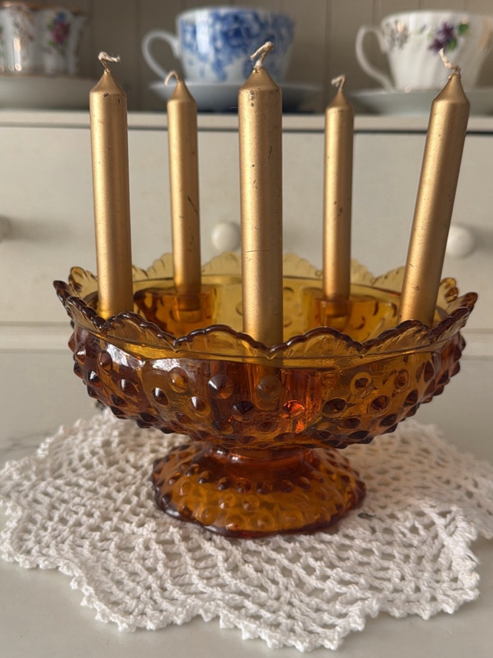 Fenton Amber Hobnail Compote with Gold Taper Candles